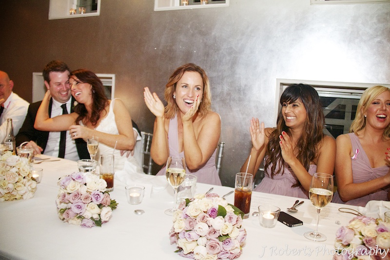 Bridesmaids laughing at wedding speeches - wedding photography sydney